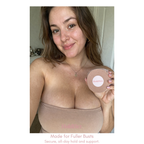 Boob tape supporting fuller bust under strapless top