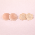 Bundle pack of Two sets of nipple covers on a light pink background