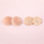 Bundle pack of Two sets of nipple covers on a light pink background